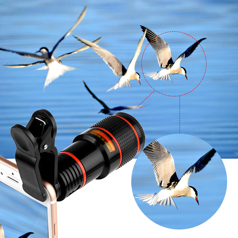 Black clip-on telescope camera lens for mobile phone with orange ring accents