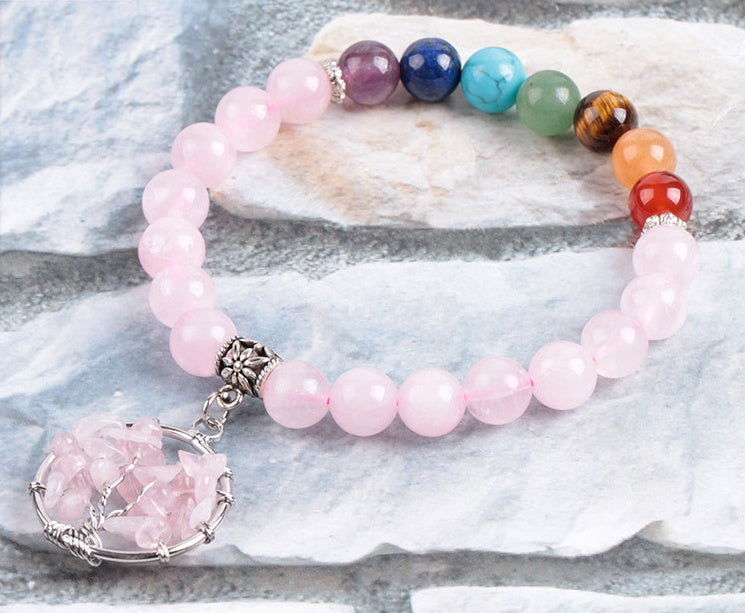 Pink crystal beaded bracelet with rose quartz wire pendant and multicolor bead accents