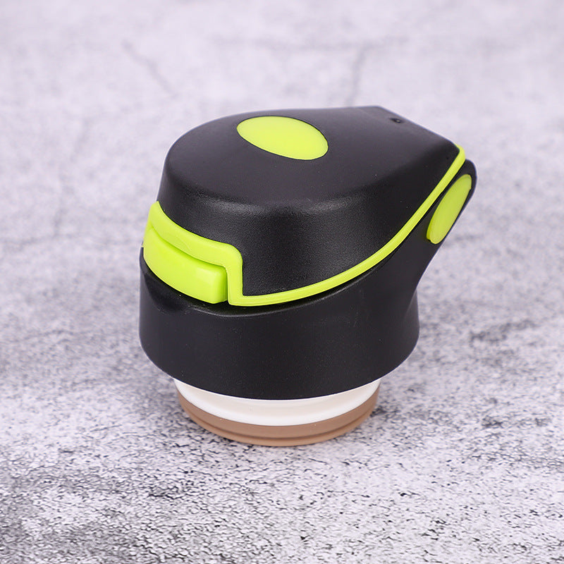 Bike water bottle in black with lime green flip cap
