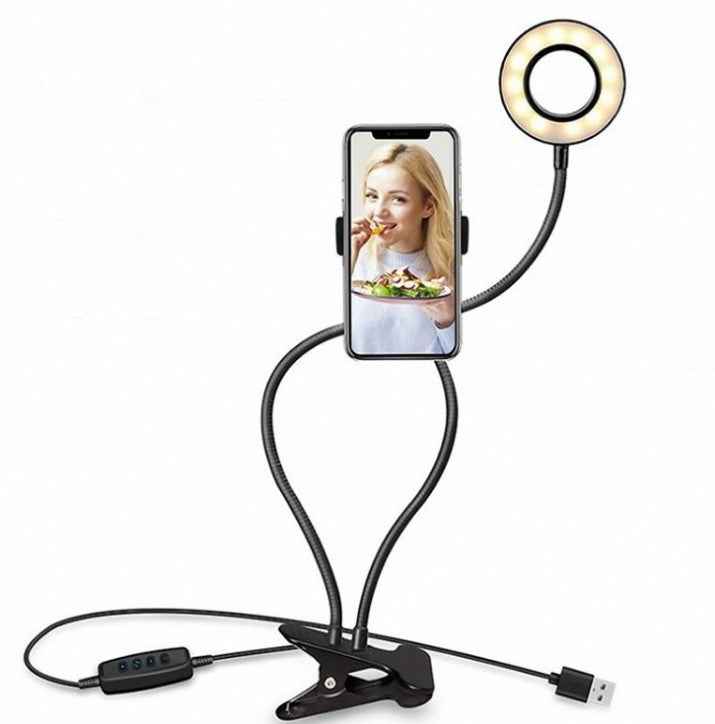 LED selfie ring light with phone clamp on flexible tripod stand, warm glow ring
