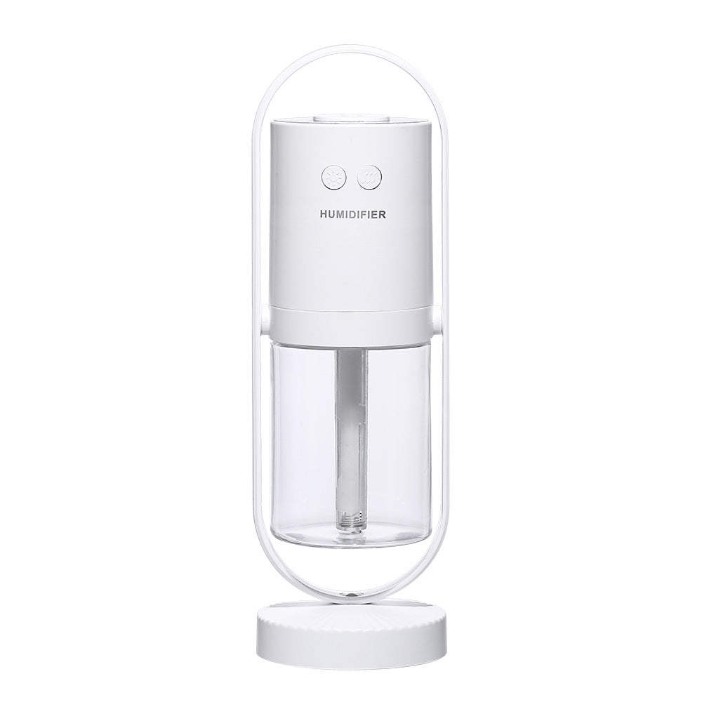 USB air humidifier in white with clear water tank and round base