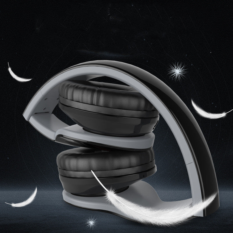 Wired gaming headset with black over-ear cushions and adjustable headband