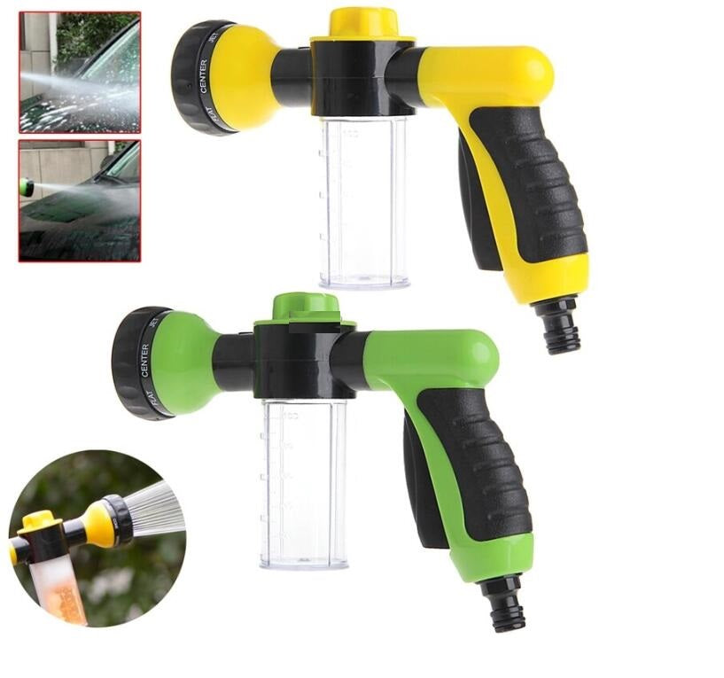 Yellow and green pressure foam spray gun with clear bottle and black handle