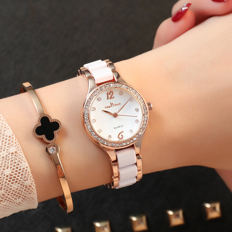 Women quartz wrist watch with white dial, rose-gold bezel, white link bracelet
