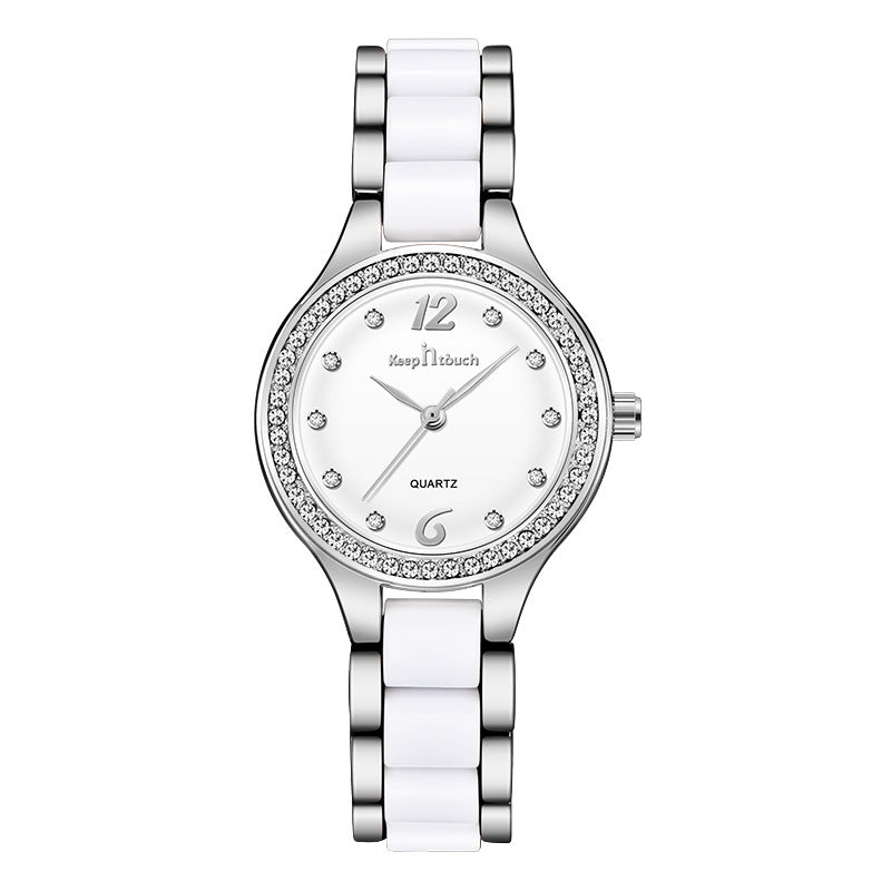 Women quartz wrist watch with white dial, silver bezel, silver link bracelet