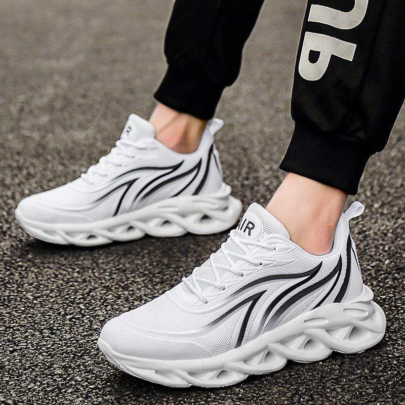 White lace-up running shoes with dark curved stripe detail and grippy tread