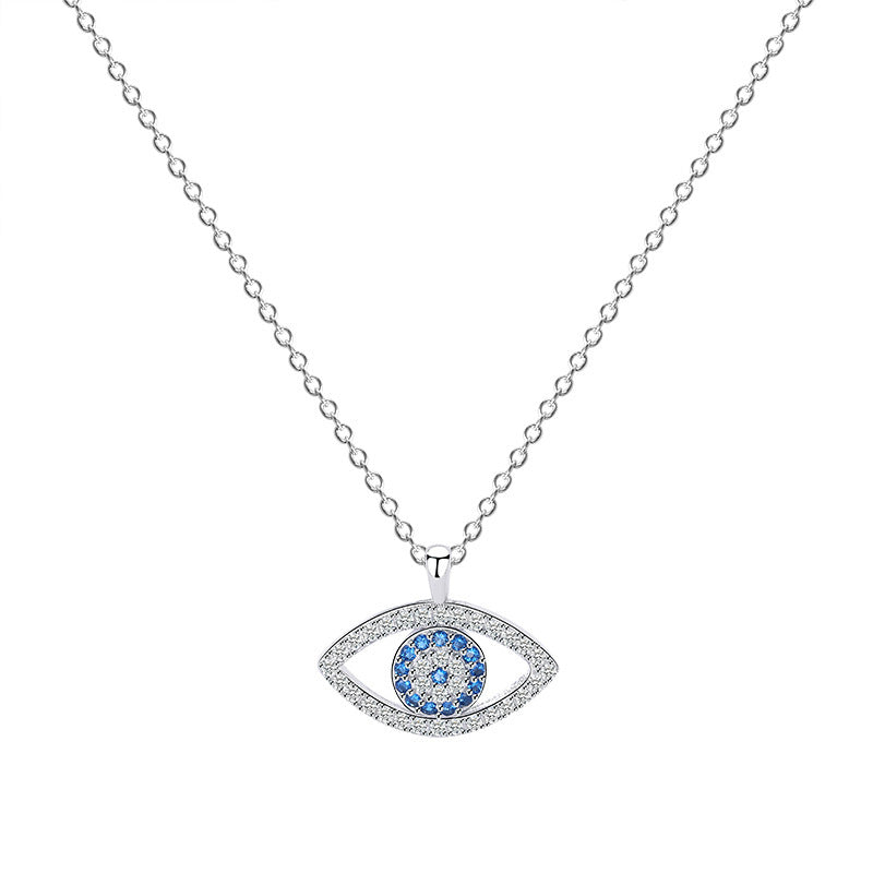 Sterling silver evil eye pendant necklace with blue eye center and pavé-edged teardrop