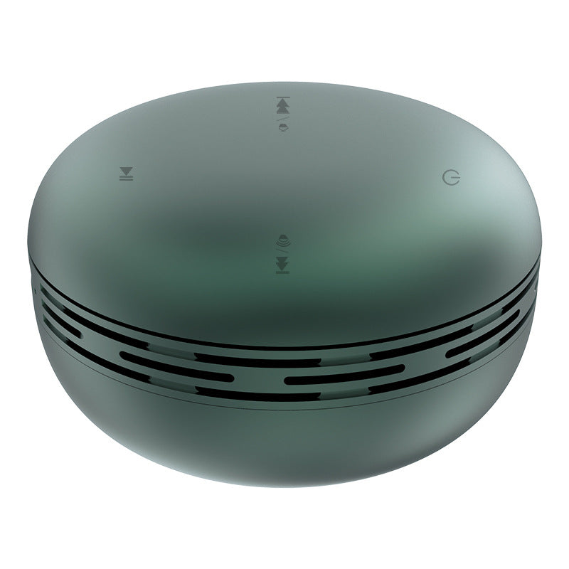 Mini Bluetooth speaker, dark green round design with vented side ring and top buttons
