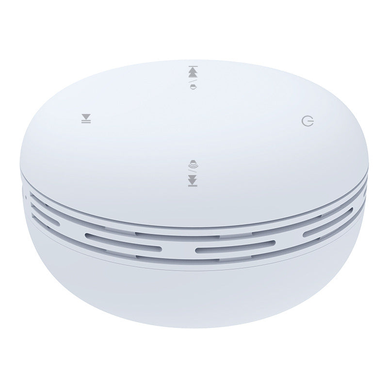 Mini Bluetooth speaker, light blue round design with vented side ring and top control icons