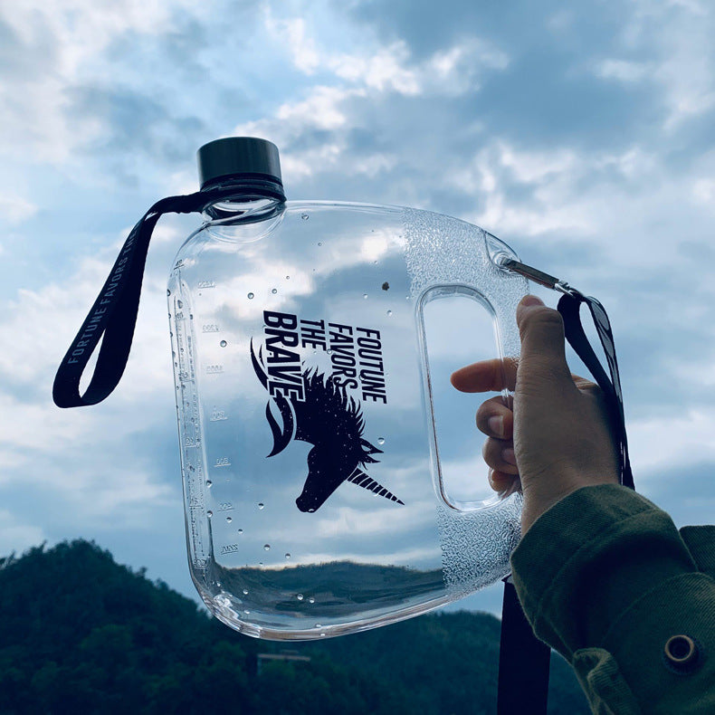 1500ml transparent plastic water bottle with black lid and carry strap