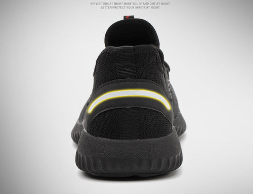 Black safety work shoes shown from heel with cushioned back and lace closure