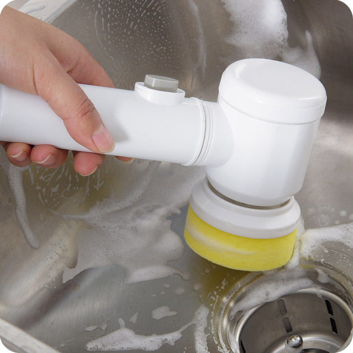 Electric scrub brush attachment with yellow sponge pad on curved white head