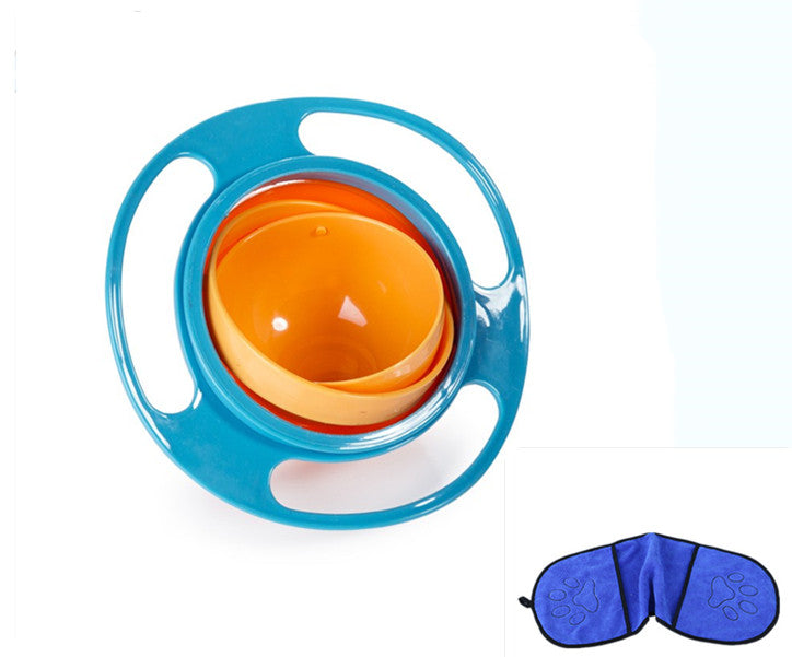 Rotating spill-proof bowl with blue outer ring and orange inner bowl