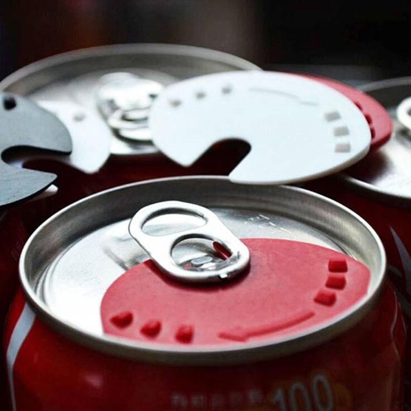 Can sealer tool with red round magnet lid on soda can top