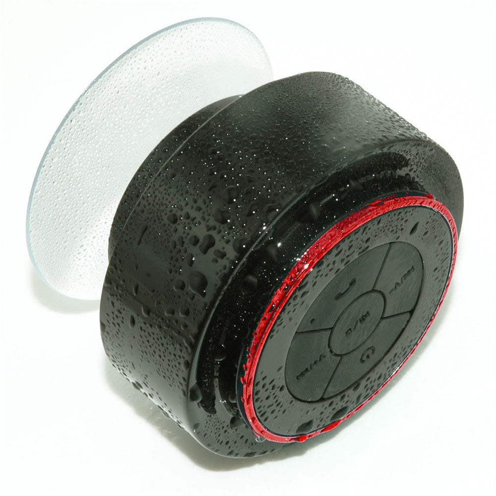 Bluetooth waterproof speaker with black body and red LED ring, side view