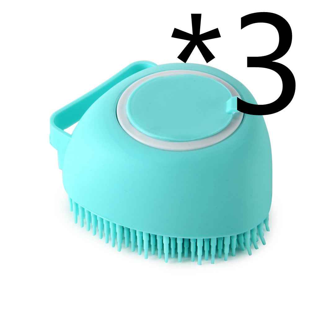 Turquoise silicone pet bath brush with circular lid and flexible bristles