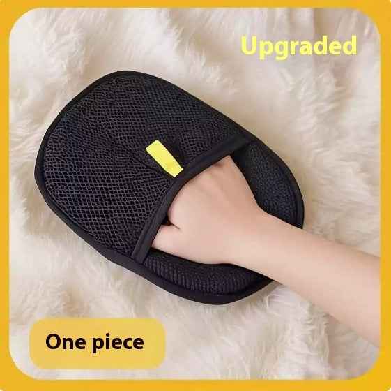 Black pet hair removal mitt with textured bristles and yellow tab, one-piece