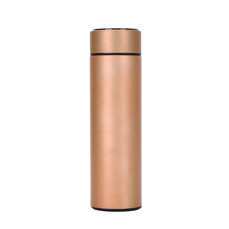 Champagne gold insulated stainless steel vacuum bottle with dark top rim