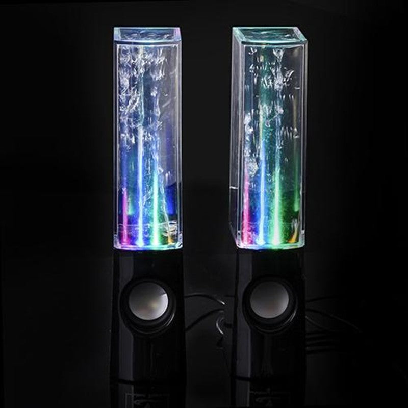 Water fountain LED speaker pair, clear tubes with blue-green glow, black bases and round woofers