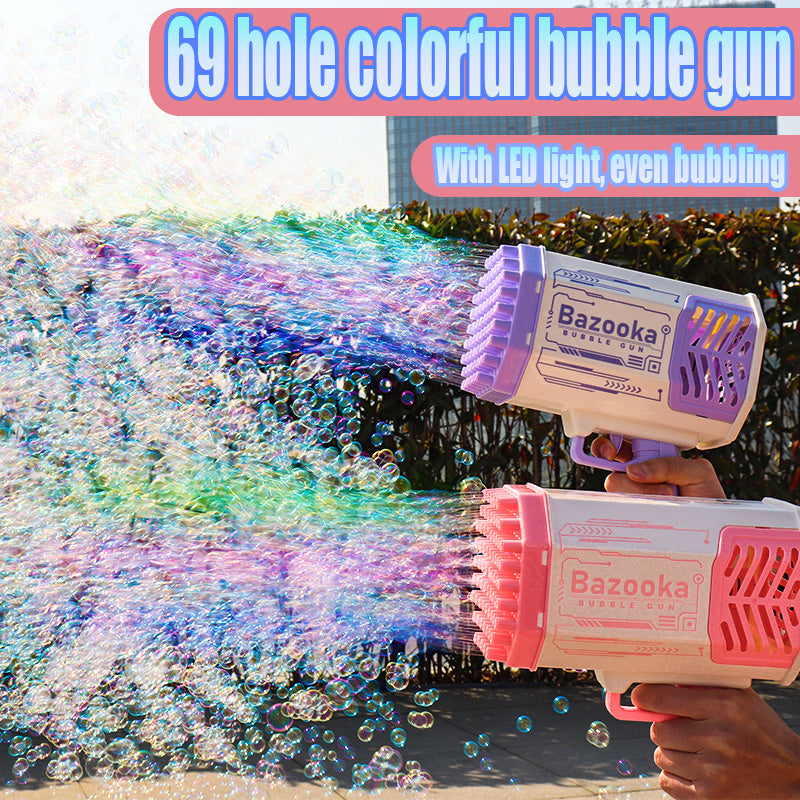 Bubble gun toy in blue and pink, wide burst of colorful soap bubbles outdoors