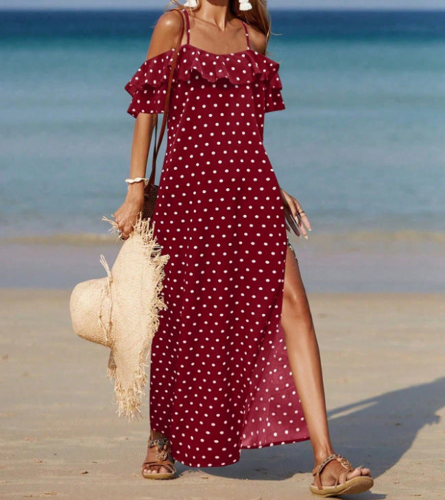 Off-shoulder long polka dot dress in red with white dots, ruffled sleeves and side slit