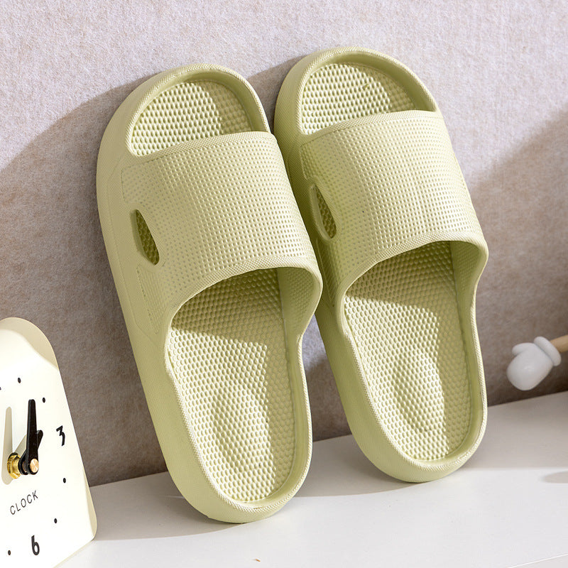 Light green thick-soled slide slippers with mesh upper and open toe, non-slip tread