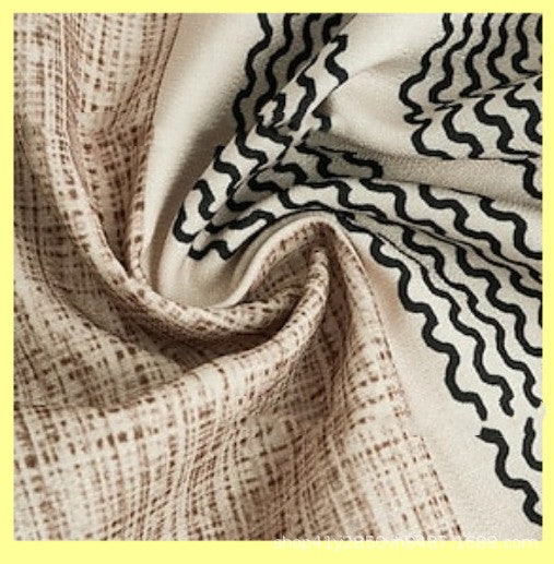 Close-up of slub linen shirt fabric with wavy black vertical stripe pattern