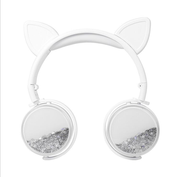 White cat-ear headphones with clear glitter ear cups and soft headband