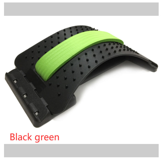 Lumbar traction waist brace with green support pad and perforated black belt