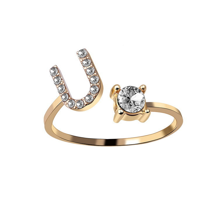 Adjustable initial letter ring with round clear stone, gold-tone pave U-shaped letter