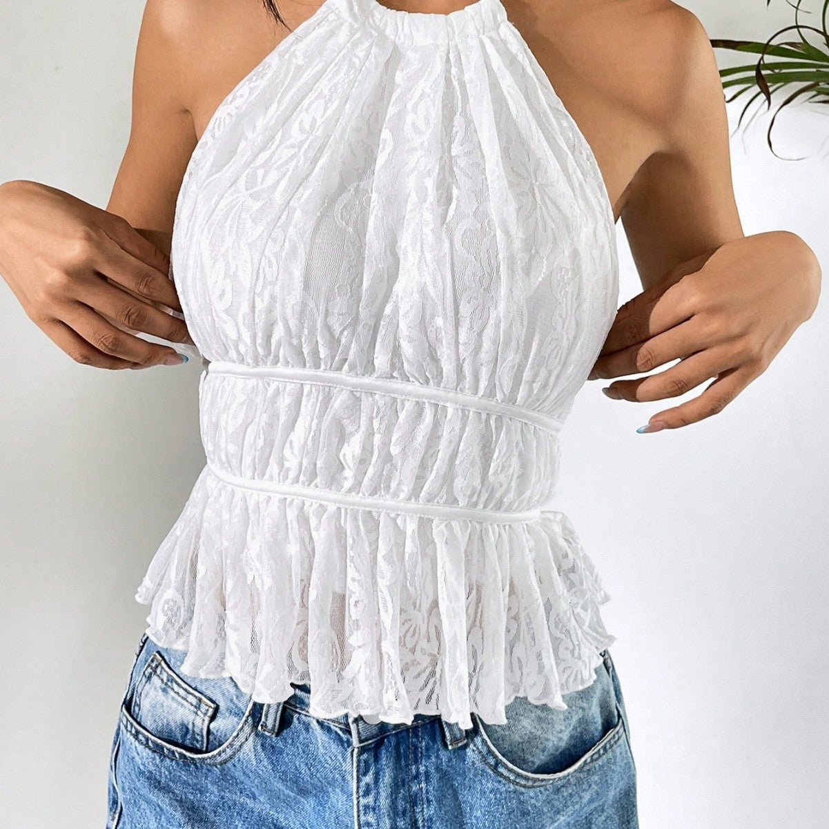 White pleated halter tie-up top with high round neck and backless tied fit