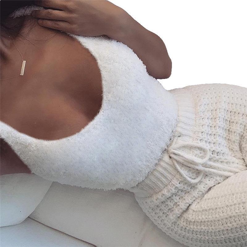 White fuzzy cropped tank top with drawstring shorts and long-sleeve cardigan sleeves