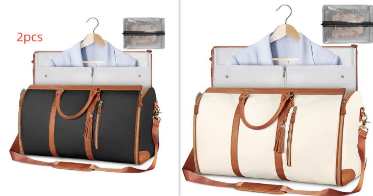 Set of travel duffle bags in dark gray and white, each with brown zipper tassels