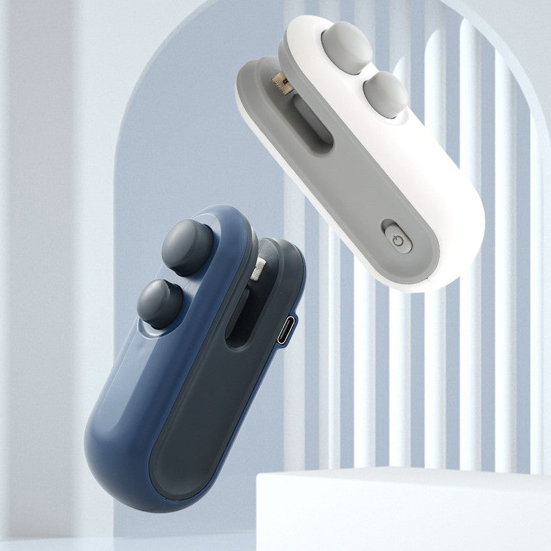 Handheld heat sealer, blue body with dual buttons and USB port