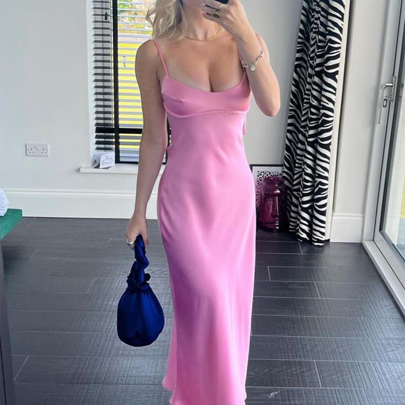 Pink satin slip dress with spaghetti straps and scoop neckline long length