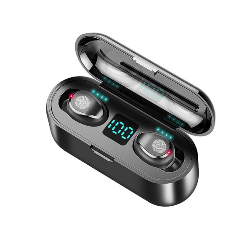 Black wireless earbuds in open charging case, blue LED meter and red/green indicators