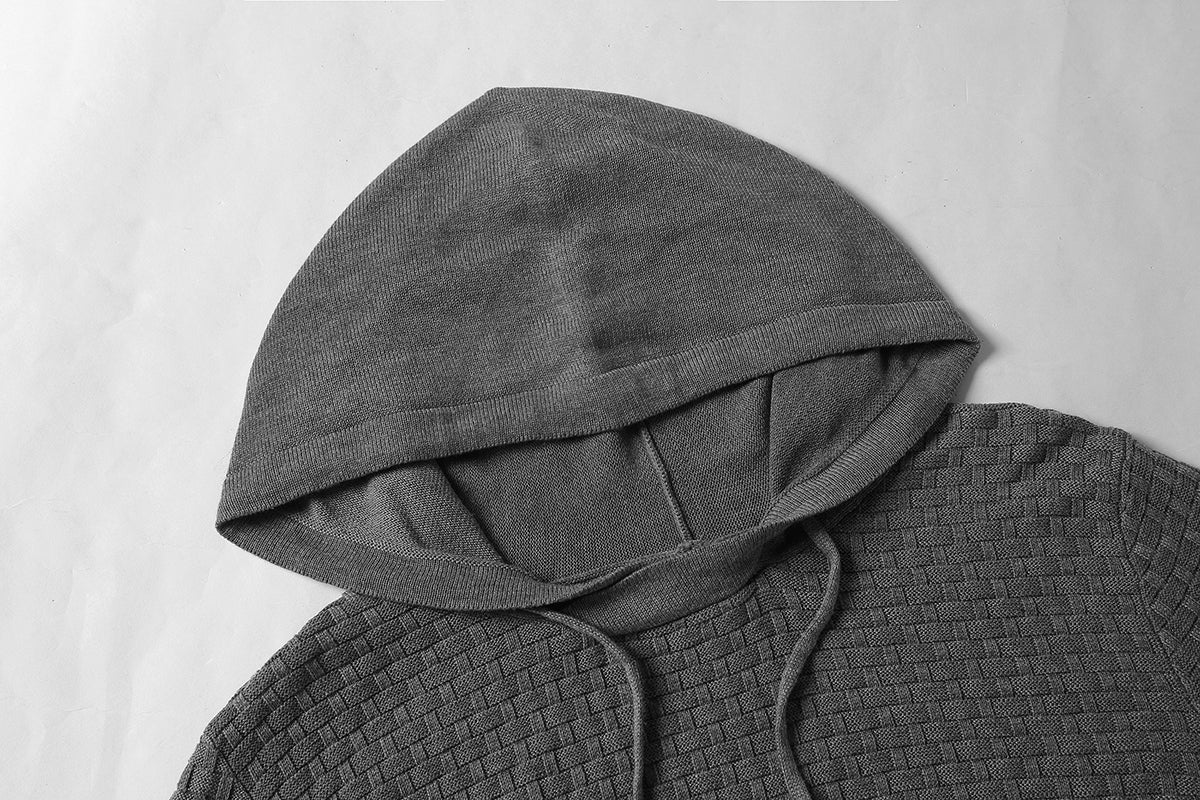 Men's hoodie sweater, gray textured knit, close-up of hood opening and drawstring ends