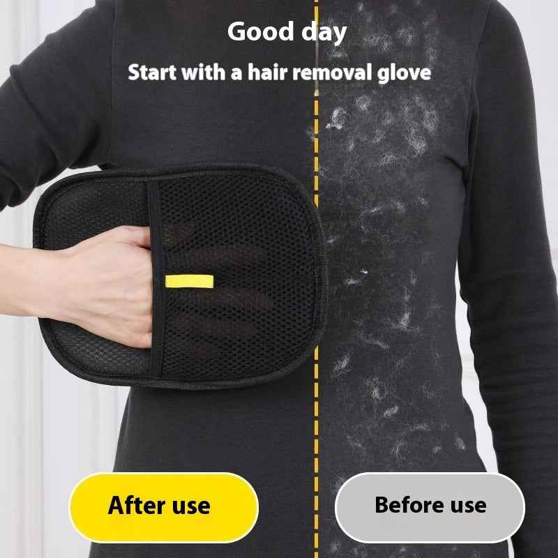 Black pet hair removal mitt with yellow tab, held on front of dark shirt