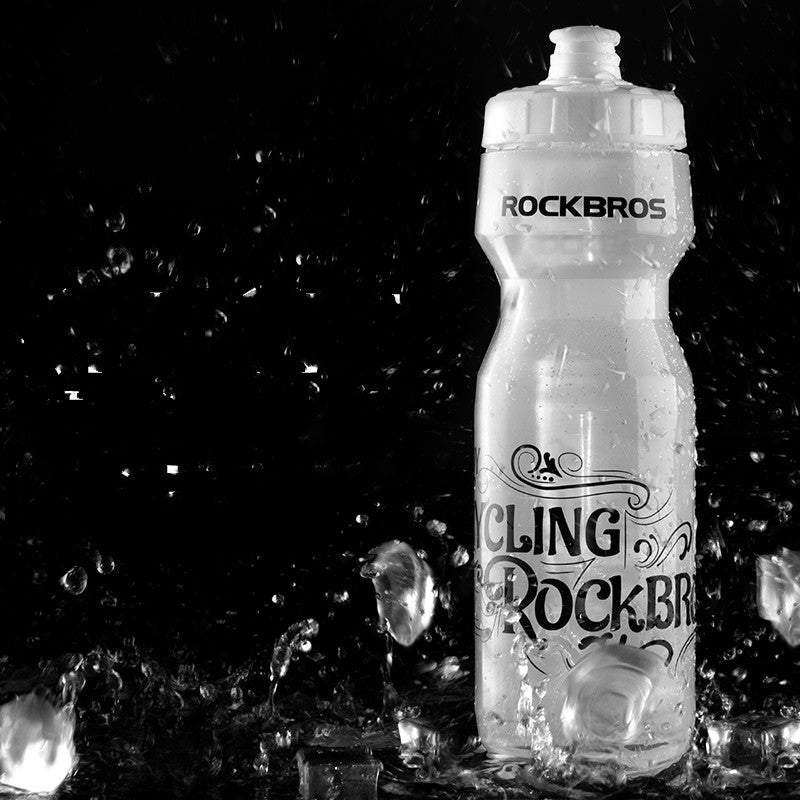 White ROCKBROS cycling water bottle shown with water splash