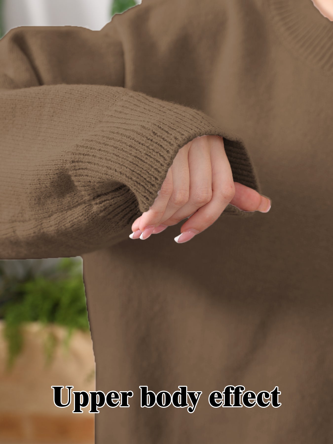 Women's home clothing set camel-brown knit top and skirt hem, hand close-up