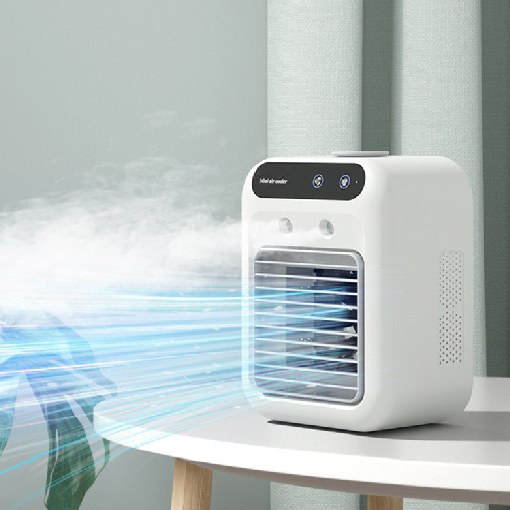 Portable mini air cooler blowing cool mist from front grille, white