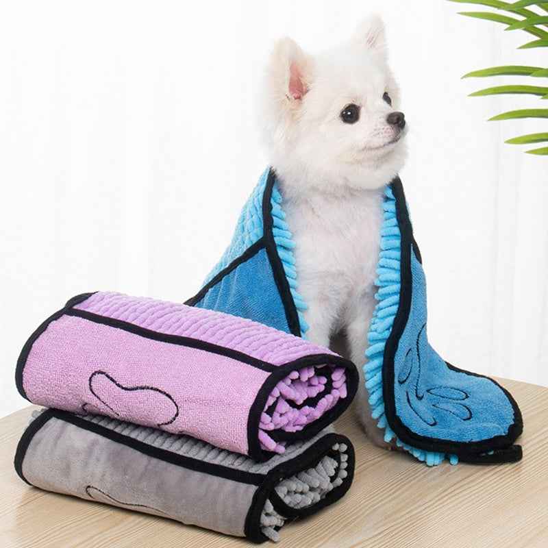 Blue and purple pet microfiber bath towels with black trim and paw doodle