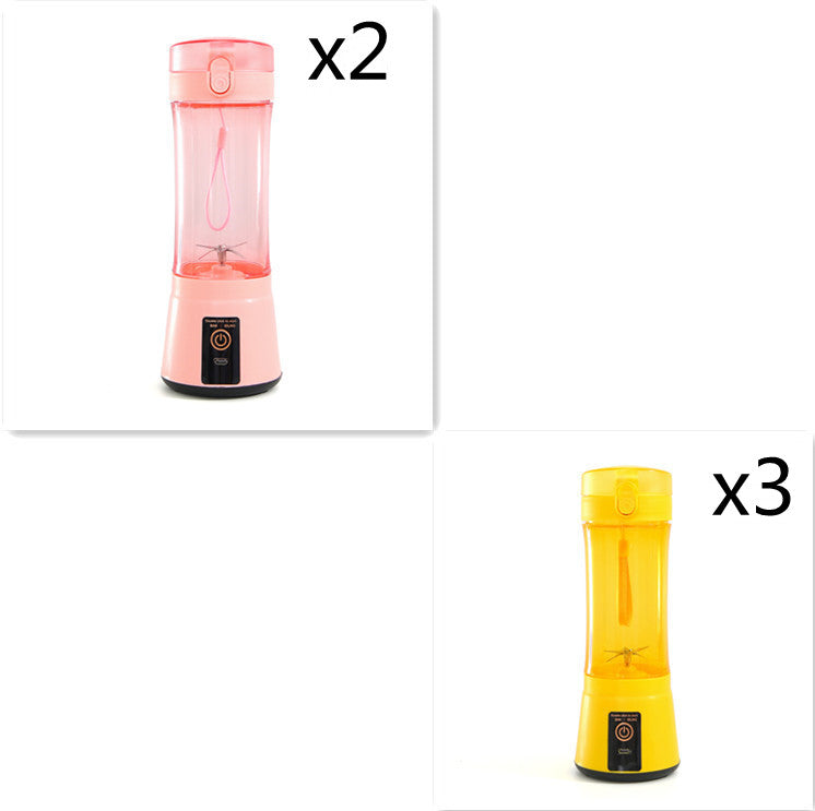 Portable electric fruit juicer with pink blender cup and yellow blender cup