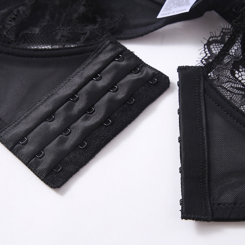 Black bra hook-and-eye front closure with rows of metal fasteners