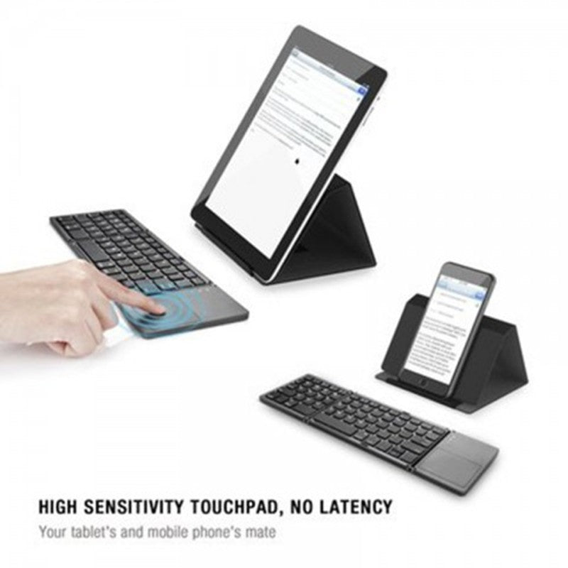 Folding Bluetooth keyboard with touchpad, shown with phones propped on stand