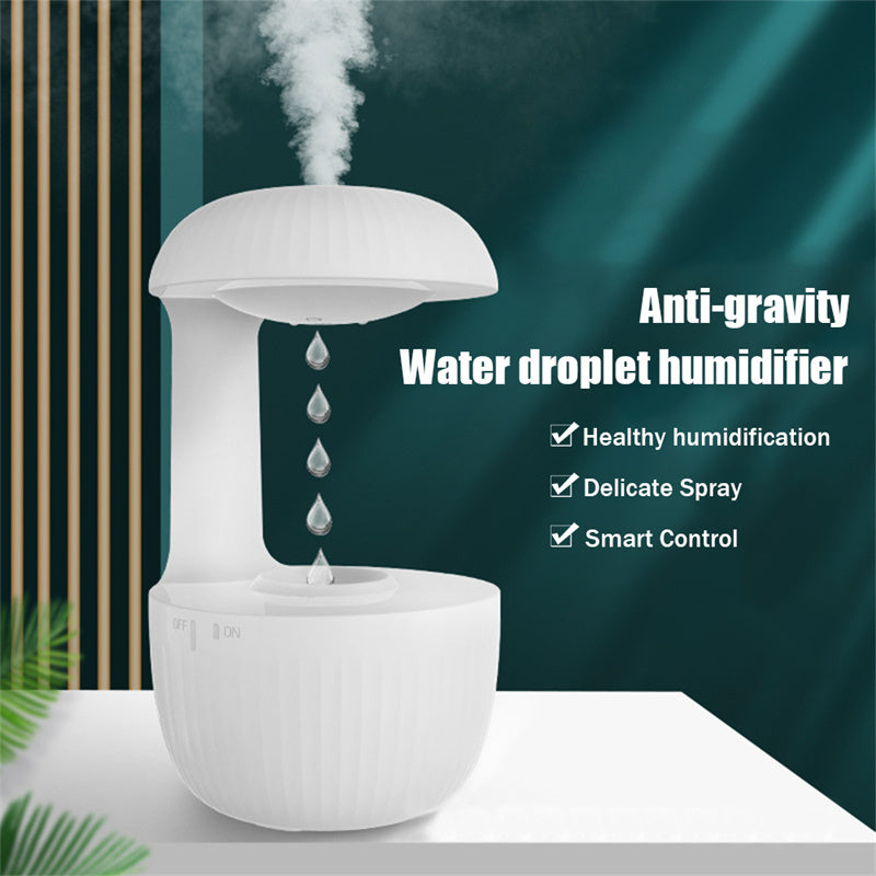 White anti-gravity cool mist humidifier with floating water droplets and vapor output.