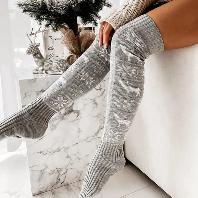 Over-the-knee knit socks in gray with snowflake and reindeer jacquard pattern