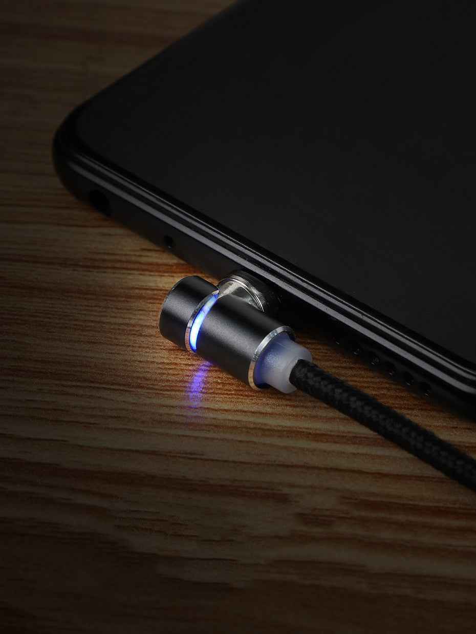 Magnetic charging cable tip with blue-lit magnetic connector on black braided cord