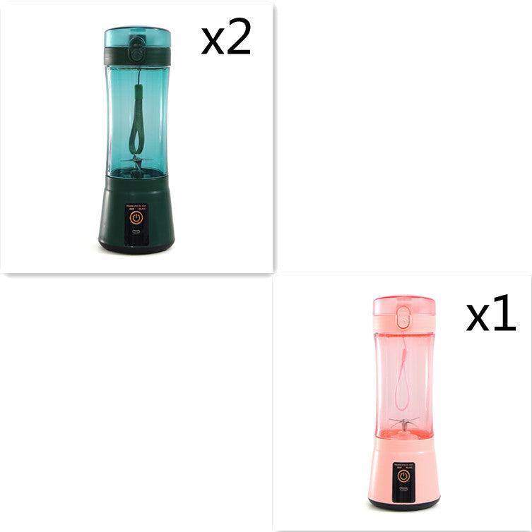 Portable electric fruit juicer blender set: teal and pink mini mixers with bases.