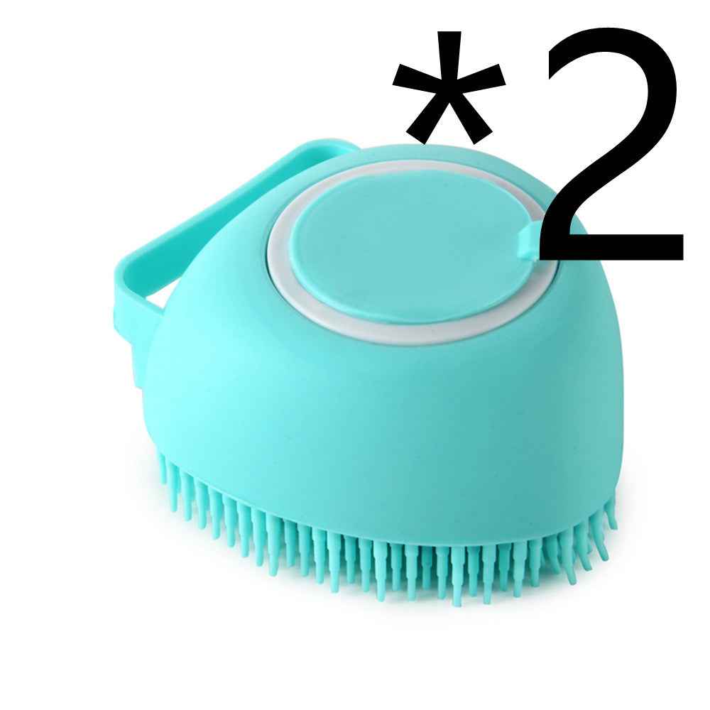 Turquoise silicone pet bath brush with circular lid and flexible bristles